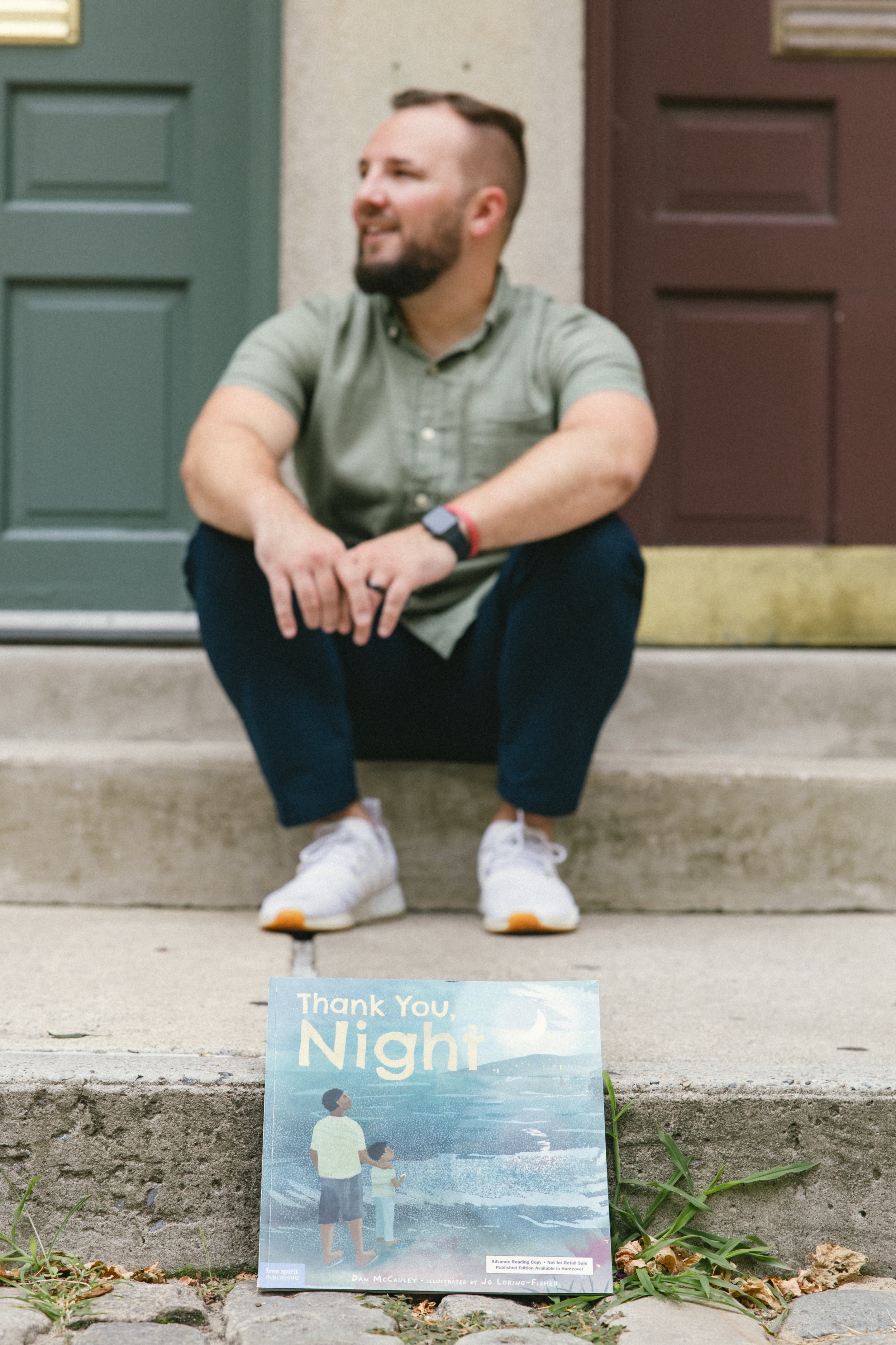 Dan McCauley with book